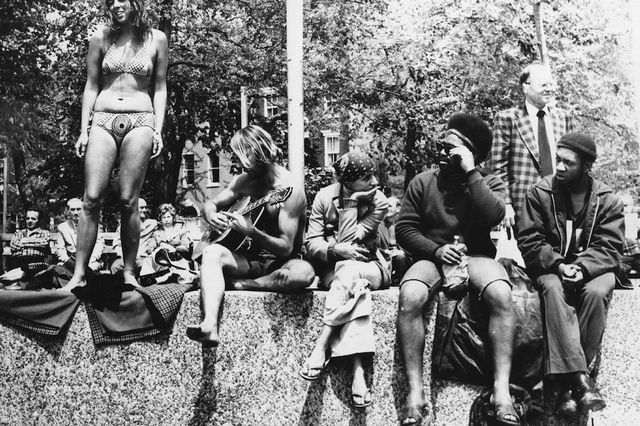 "A group of young people singing and making music in Washington Square Park, part of New York's Greenwich Park. 1968."